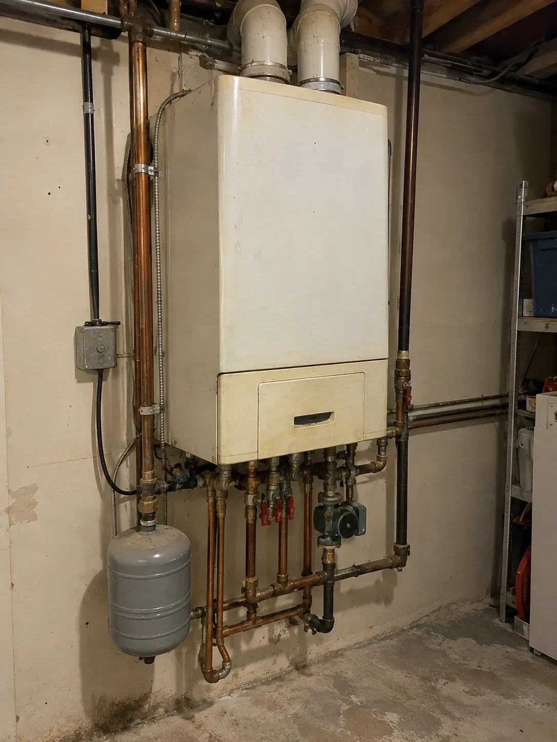 Older residential wall-mounted boiler, around 18 years old